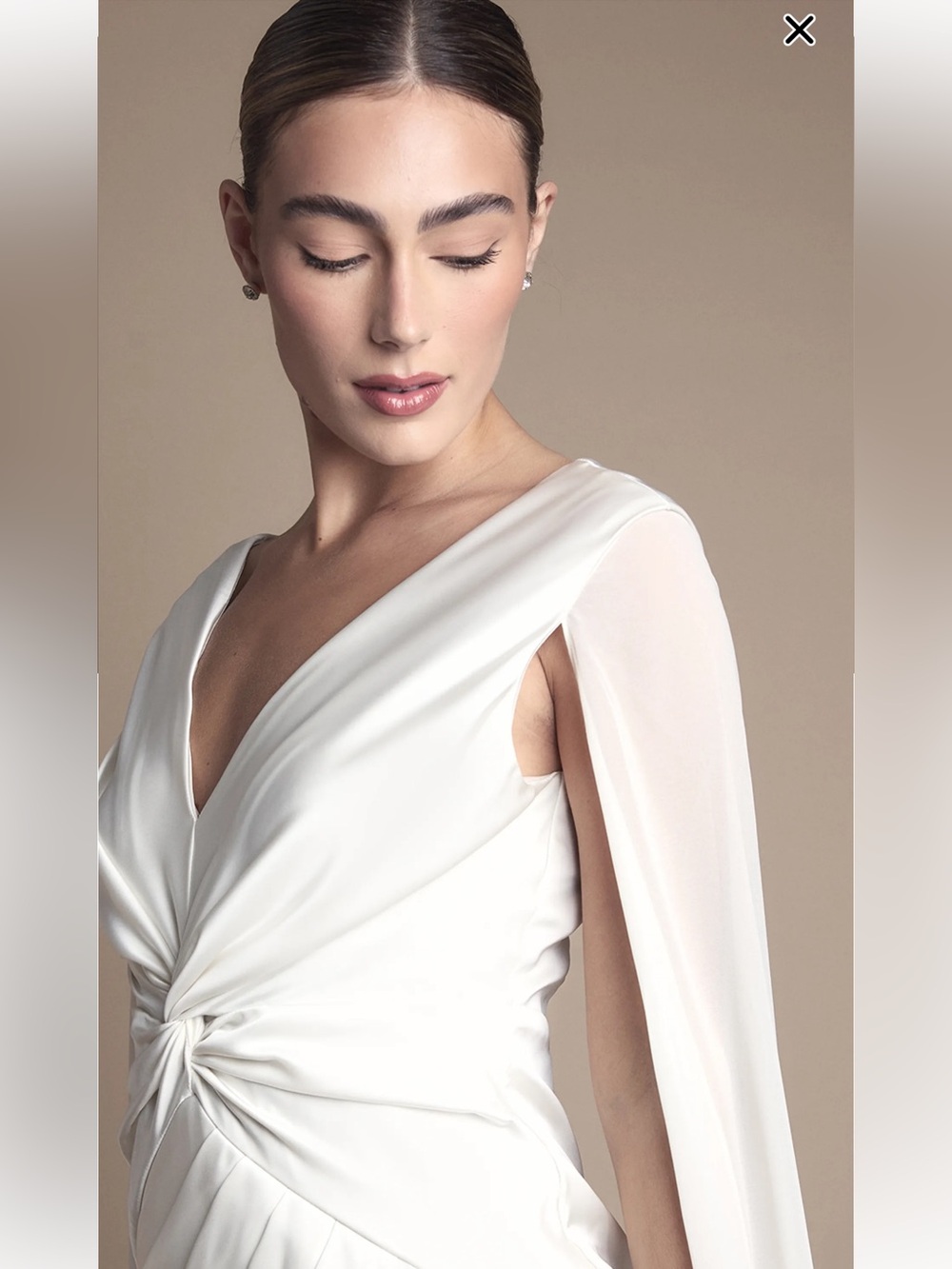 Sleek White V-Neck Wedding Dress with Draped Cape Detail - Picture 3 of 5